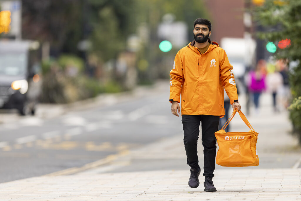 A Just Eat courier delivering